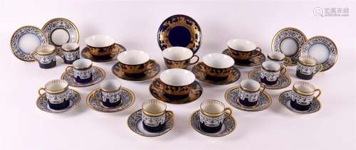 A lot of various cobalt blue and gilt porcelain cups and sau...