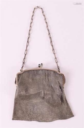 A 2nd grade 830/1000 silver purse bracket on a chain mail po...