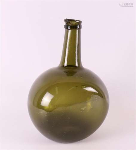 A green glass bottle, 18th century.