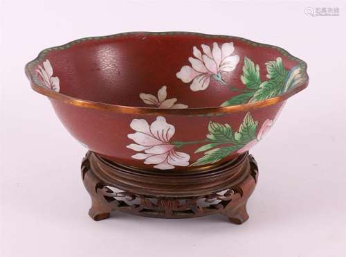 A contoured cloissoné bowl on a loose wooden pedestal, China...