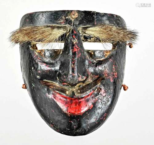 Mask, black colored ritual mask mad