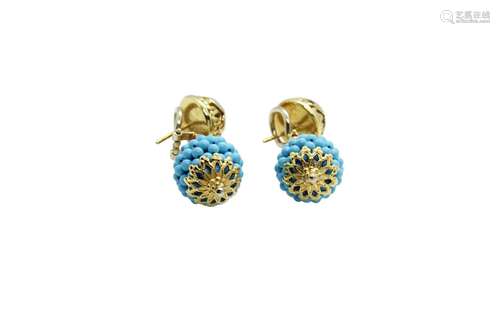 A pair of 18k gold turquoise earrings