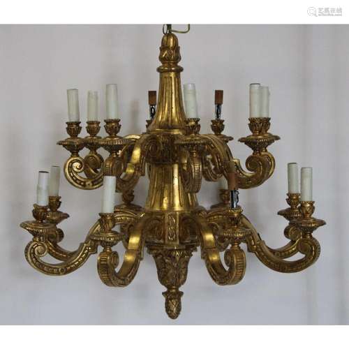 Large Carved Giltwood Multi Arm Chandelier.