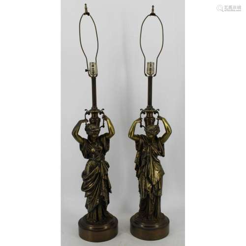 An Antique Pair Of Bronze Figural Lamps.