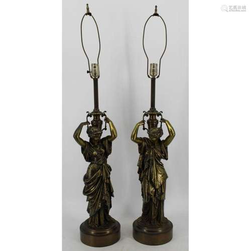 An Antique Pair Of Bronze Figural Lamps.