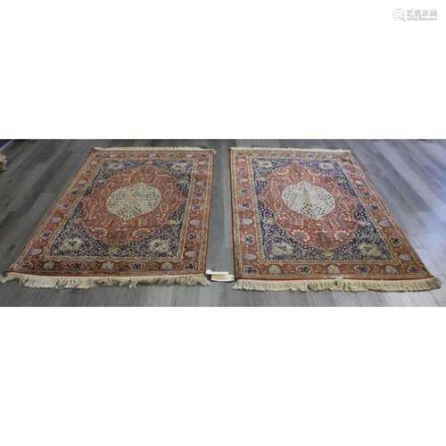 An Antique Pair of Finely Hand Woven Carpets