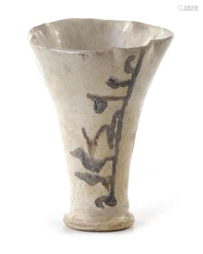 AN ABBASID CALLIGRAPHIC POTTERY CUP, MESOPOTAMIA, 9TH CENTUR...