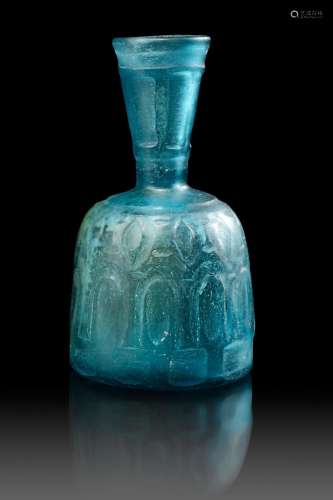 A FINE PALE BLUE CUT GLASS BOTTLE WITH FUNNEL NECK, PERSIA, ...