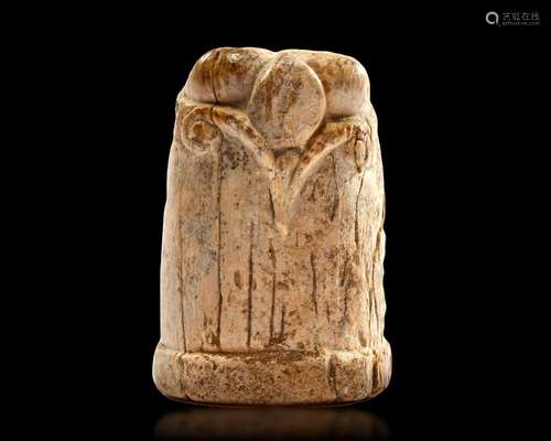 A CARVED IVORY CHESS PIECE, EGYPT OR IRAQ, 10TH-11TH CENTURY