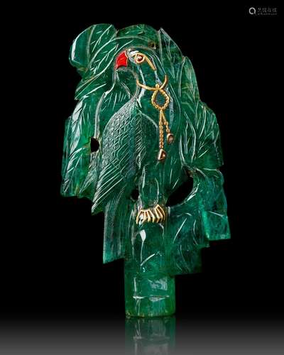 A MUGHAL CARVED EMERALD DEPICTING A PARROT IN A TREE, 19TH C...