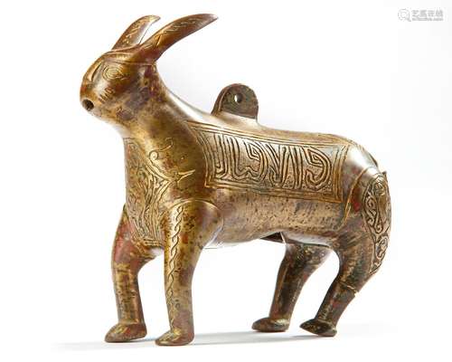 A BRONZE INSCRIBED FATIMID HARE, 10TH-11TH CENTURY