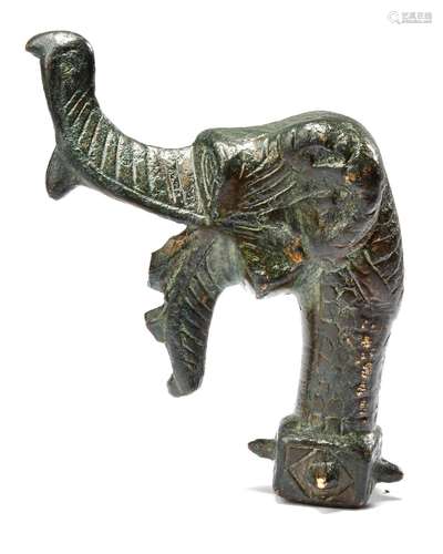 A BRONZE ELEPHANT SPOUT TERMINAL, PERSIA OR CENTRAL ASIA, 11...