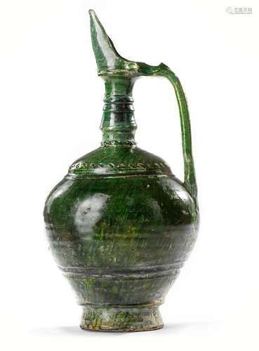 A UMAYYAD GREEN GLAZED POTTERY JUG, EASTERN MEDITERRANEAN, 8...