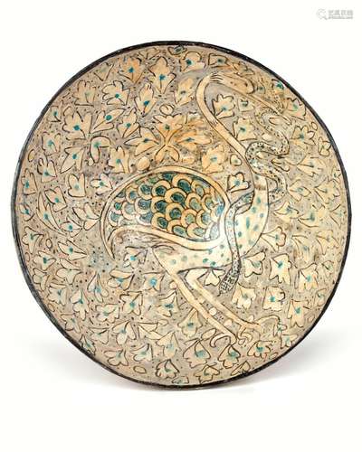 AN ISLAMIC BOWL DEPICTING A BIRD, SULTANABAD WARE, 12TH-13TH...