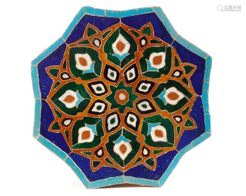 A LARGE TIMURID CUERDA-SECA STAR TILE, PERSIA, 15TH CENTURY