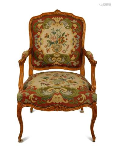 A Louis XV Style Carved Mahogany Fauteuil
