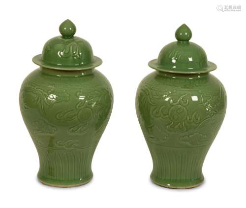 A Pair of Celadon Glazed Covered Jars Height 26 1/2 inches.