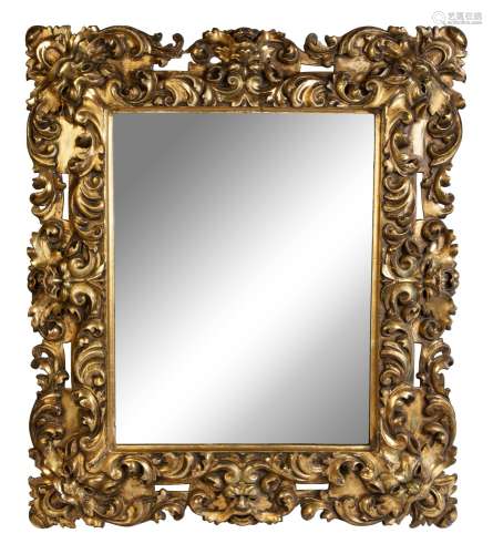 An Italian Giltwood Mirror Height 42 x width 36 inches.