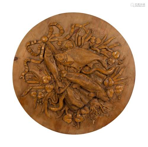 A Pair of Continental Carved Game Plaques Depicting Fish Dia...