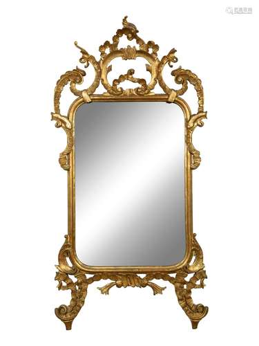 A Louis XV Style Giltwood Mirror Height 57 1/2 x width 30 in...