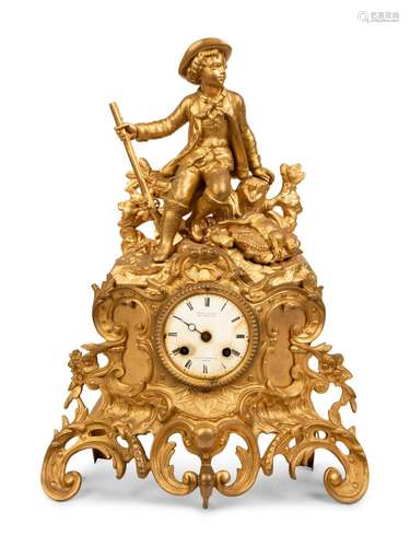 A French Gilt Metal Figural Clock Height 16 x width 12 x dep...