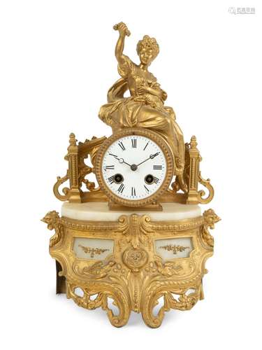 A French Gilt Metal and Alabaster Clock Height 14 1/2 x widt...