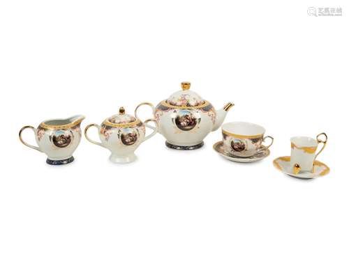 A Continental Porcelain Tea Set Height of teapot 6 inches.