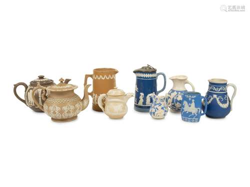 A Collection of Nine English Salt Glazed Relief Form Teapots...