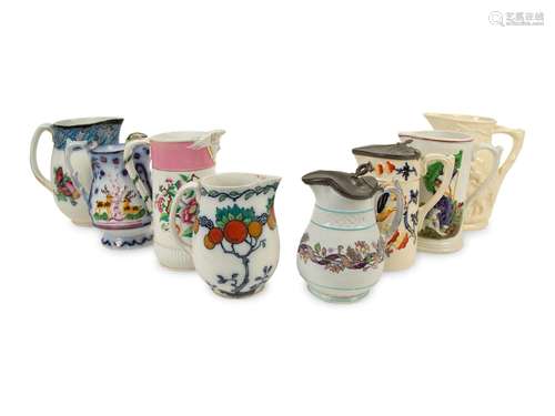 A Collection of Eight Painted, Transferware and Molded Earth...