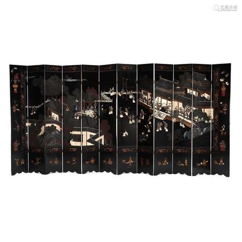 A Chinese Twelve Panel Coromandel Lacquered Screen