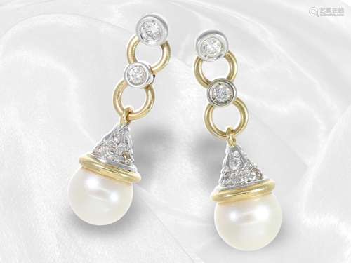 Ear jewelry: beautiful goldsmith work with pearls and diamon...