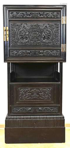 Cabinet with filigree carvings insi