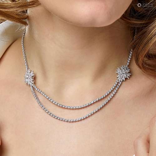 COLLIER RIVIERE ETOILE DIAMANTS A diamond and 18K white gold...