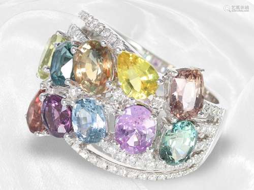 Ring: Designer ring opulently set with fine colored sapphire...