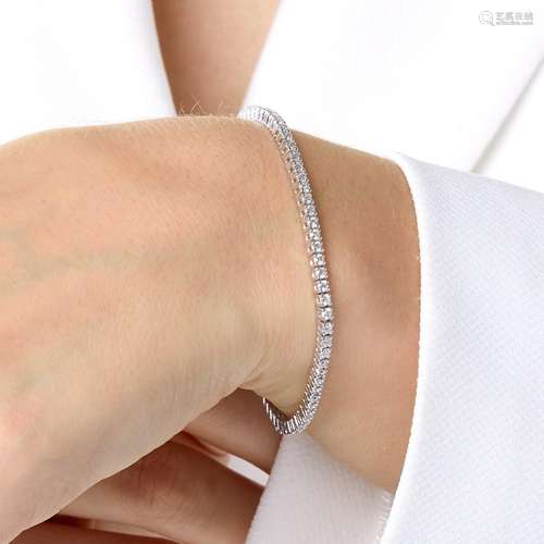 BRACELET LIGNE DIAMANTS A diamond and 18K white gold tennis ...