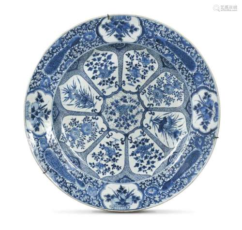 A Chinese blue and white porcelain peacock charger, Qing Dyn...