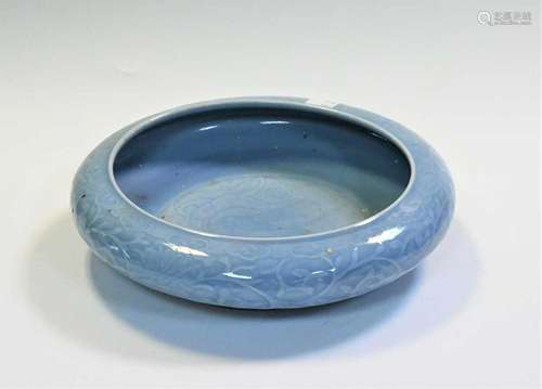 A Chinese clair- de- lune glazed and carved shallow bowl, la...