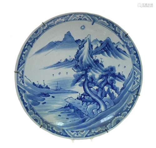 A Japanese blue and white porcelain large charger, late Meij...