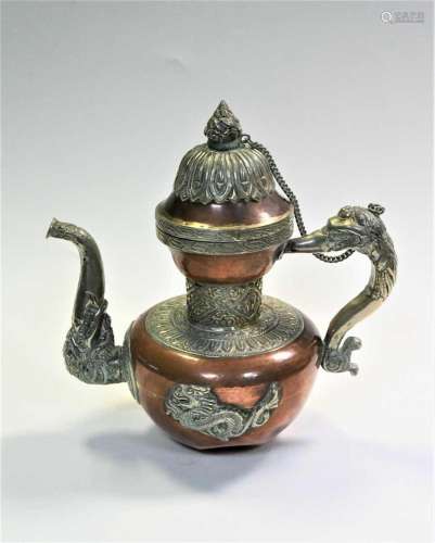 A Tibetan copper and silver plated butter- tea pot, late 19t...