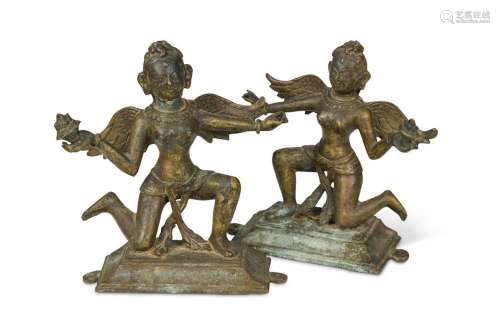 A matched pair of Tibetan bronze figural altar appliqués, pr...