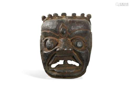 A carved wood Lamaist dancer's mask of Krodha, Tibet/Ne...