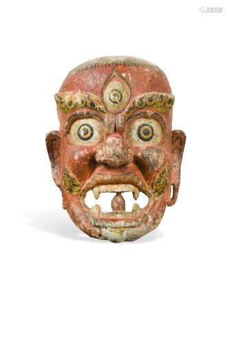 A carved wood Lamaist Sungma mask, Southern Tibet, probably ...