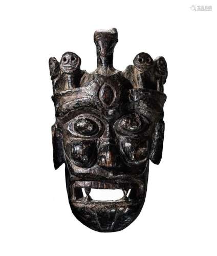 A rare and important carved wood mask of Krodha, Southern Ti...