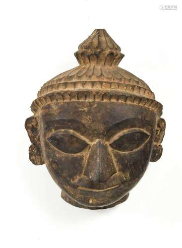 A Tamang carved wood head of Buddha, Ganesh Himal Region or ...