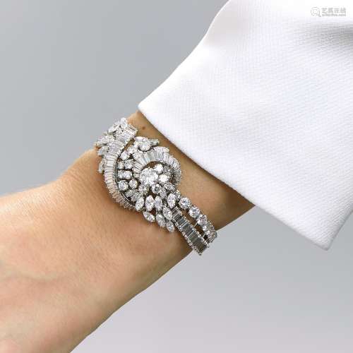 A diamond, platinum and 18K white gold bracelet, circa 1960....