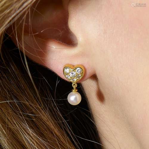 TIFFANY & C° PAIRE DE MOTIFS D'OREILLES COEUR A cul...