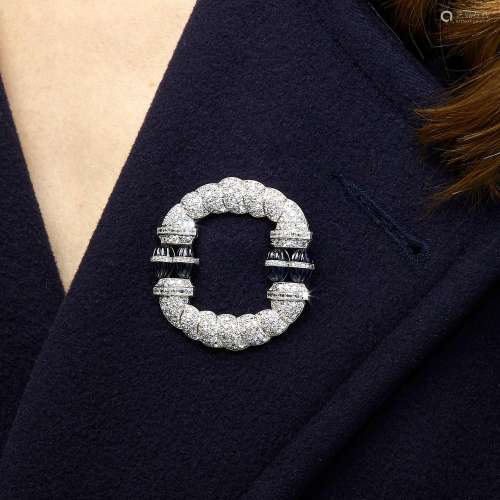 An Art Deco brooch, set with reeded sapphires, old European ...