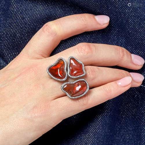 GRANDE BAGUE OPALE DE FEU A fire opal, diamond and 18K black...