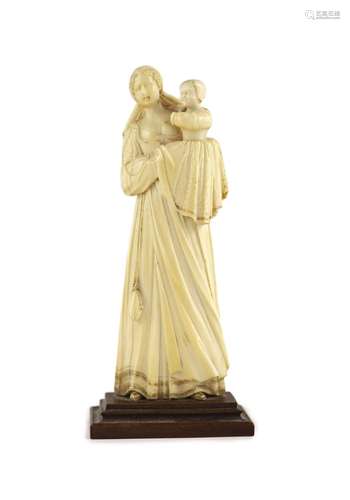 A 17th century French ivory group of a mother and child Heig...