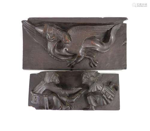 Two carved oak misericord panel fragments, 15th/16th century...